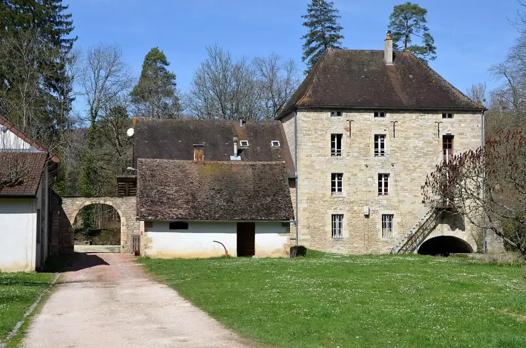 Stone building and lawn at Abbaye de la Bussière, 2013-04-14