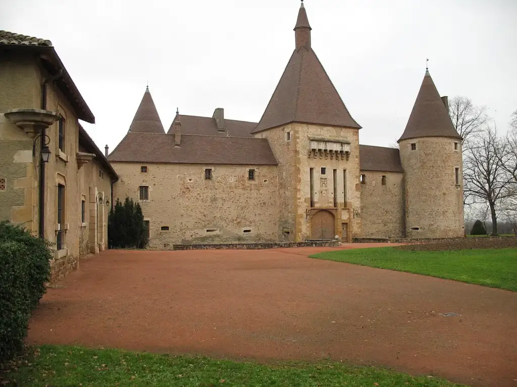 Facades and towers of Château de Corcelles-en-Beaujolais seen from the courtyard