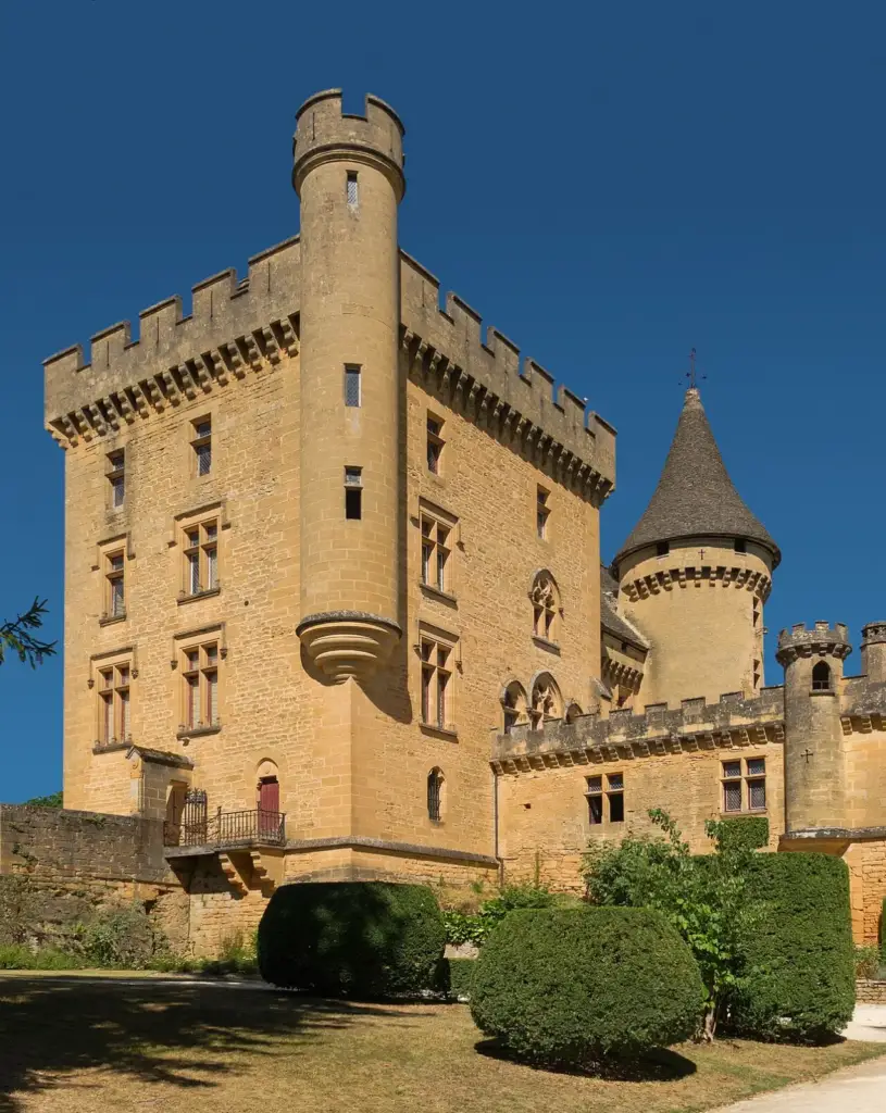 Keep and towers of Château de Puymartin seen from the gardens