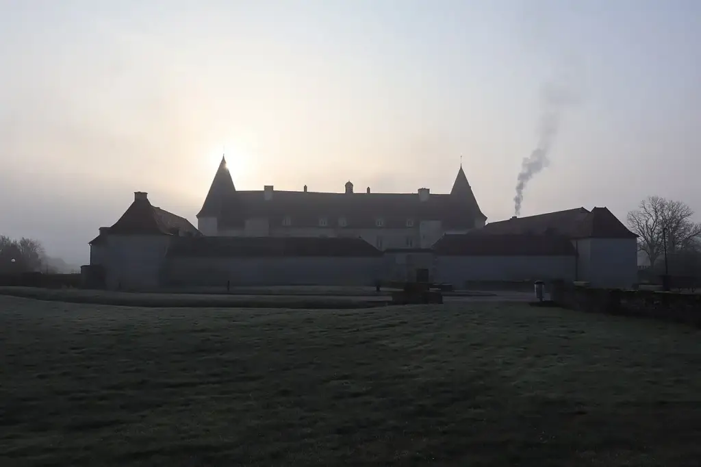 Exterior view of Château de Chailly-sur-Armançon on a misty morning, March 2023.
