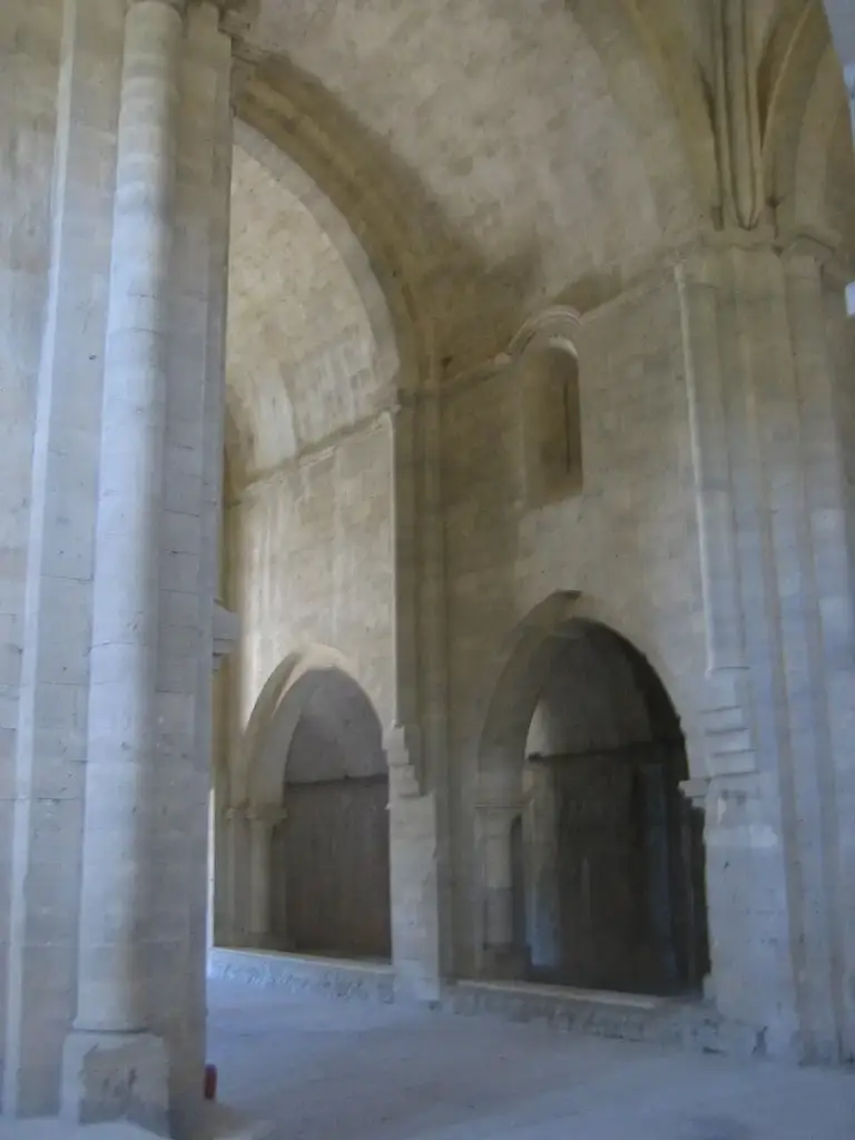 Columns and arches inside Silvacane Abbey church
