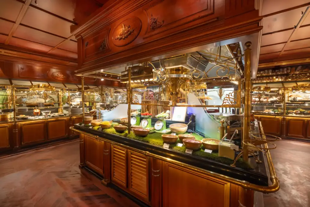 Illustrative photograph of a buffet and reception, by Madroune, CC BY-SA 4.0, Wikimedia Commons. Does not depict the caterer’s services.