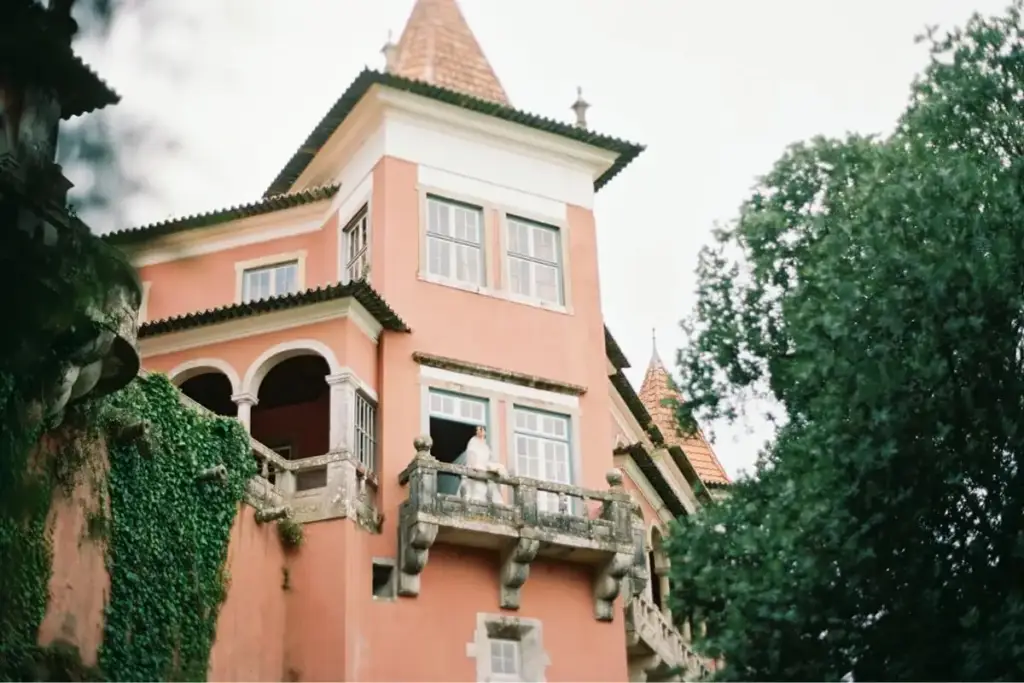 Casa dos Penedos facade in Sintra surrounded by greenery