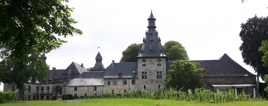 Rear façade and park of Château de Bioul, a vineyard estate in Bioul, Wallonia