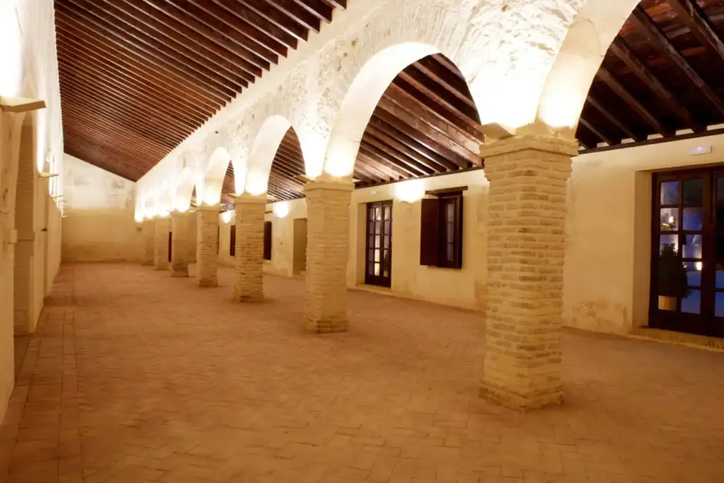 Indoor reception hall with arches at Hacienda La Soledad