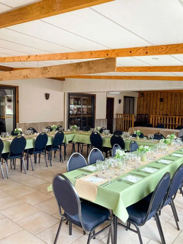 Domaine de la Dune Blanche reception room with laid tables